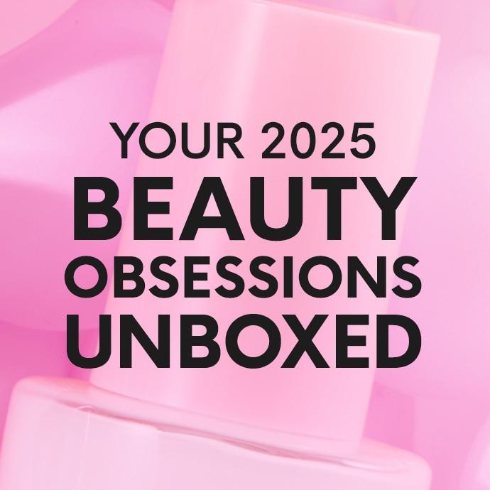 A pink graphic with the text “Your 2025 Beauty Obsessions Unboxed” in bold black lettering over a soft pink background featuring blurred beauty product silhouettes.