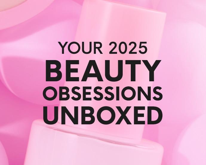 A pink graphic with the text “Your 2025 Beauty Obsessions Unboxed” in bold black lettering over a soft pink background featuring blurred beauty product silhouettes.