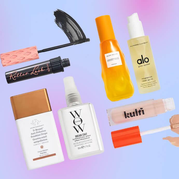 A diagonal pastel collage of beauty products from Benefit, Glow Recipe, AloY, Drunk Elephant, Color Wow, Kulfi, and Drunk Elephant, featuring mascara, foundation, sunscreen, serum, and lip gloss