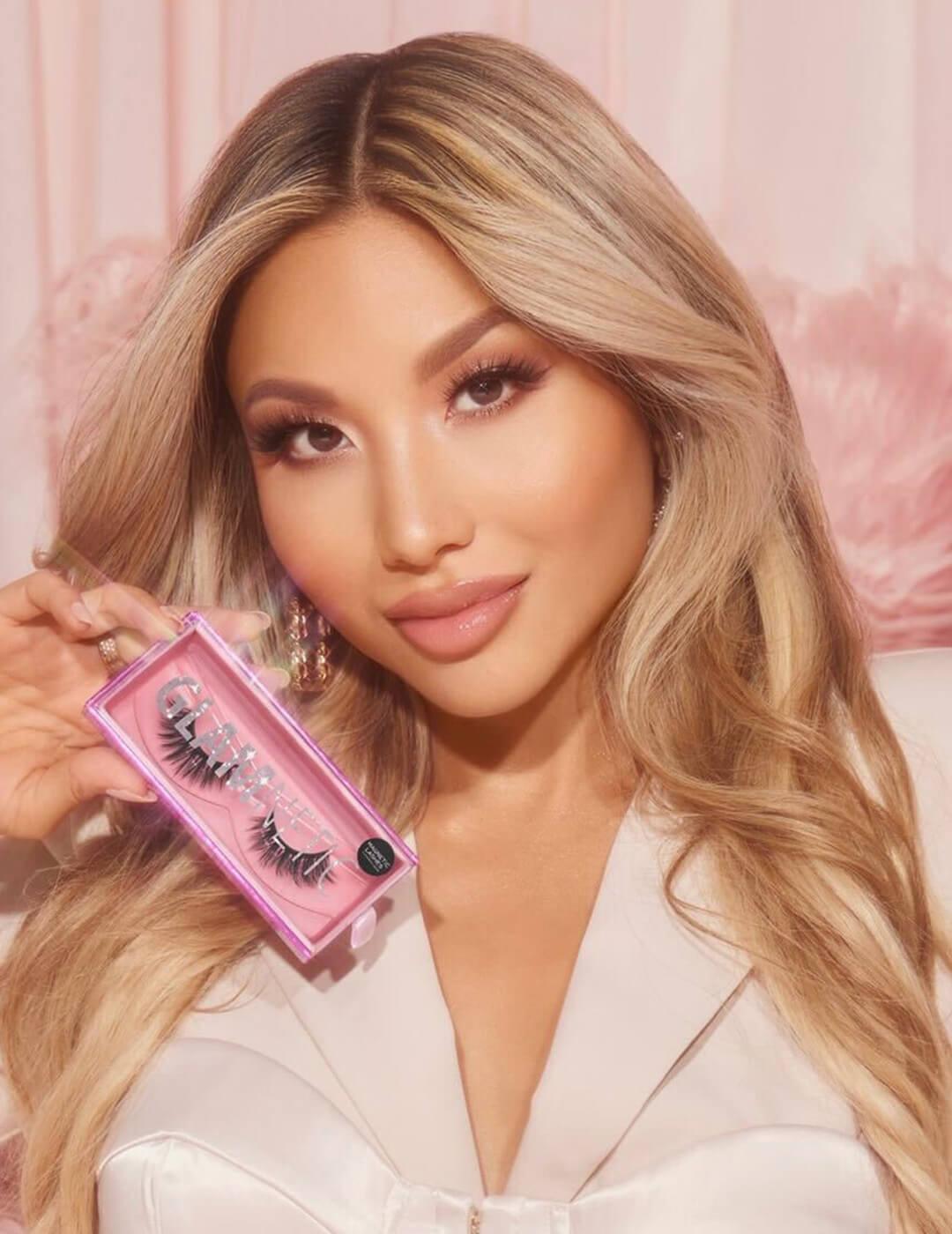 Portrait image of Ann McFerran holding GLAMNETIC false lashes Mobile