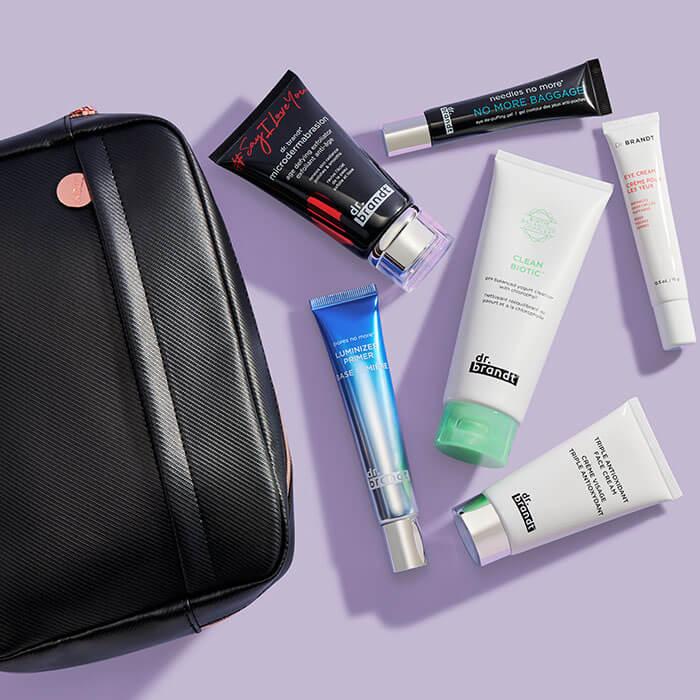 Black makeup pouch and skincare products from DR. BRANDT on lilac background Mobile