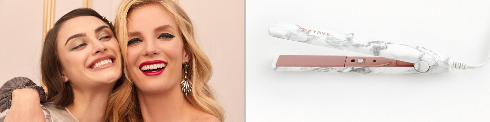 An image of a brunette model and blonde model with different makeup looks smiling and an image of FOXYBAE Mini Travel Flat Iron Desktop