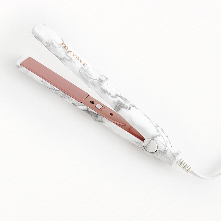 An image of a brunette model and blonde model with different makeup looks smiling and an image of FOXYBAE Mini Travel Flat Iron Mobile