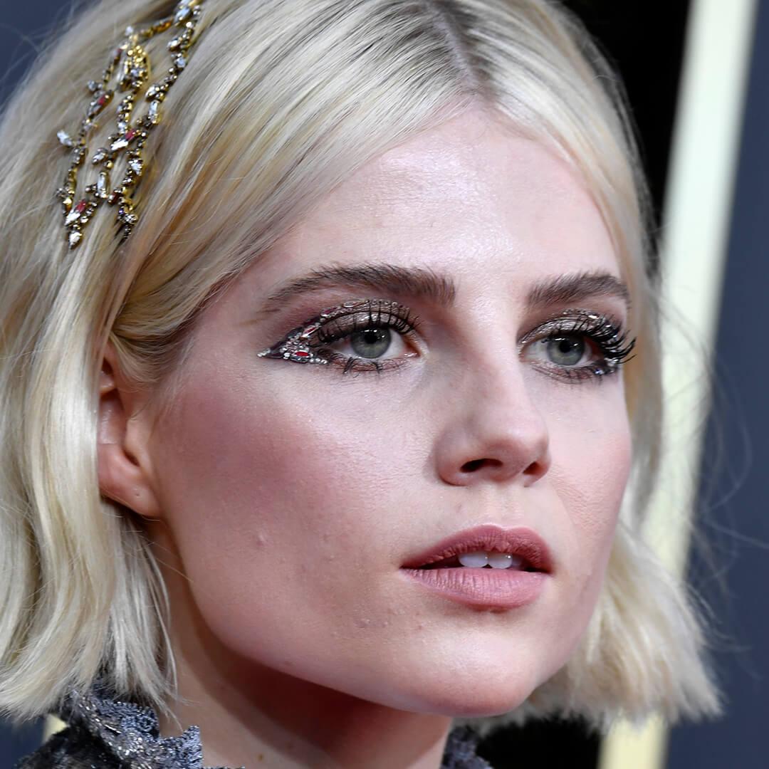 Lucy Boynton rocking a graphic glittery eyeliner look Mobile