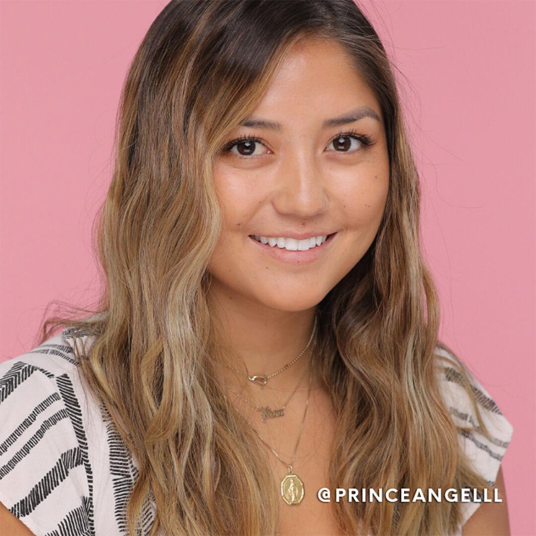 A model shows off the S-waves made with her straightener. Mobile