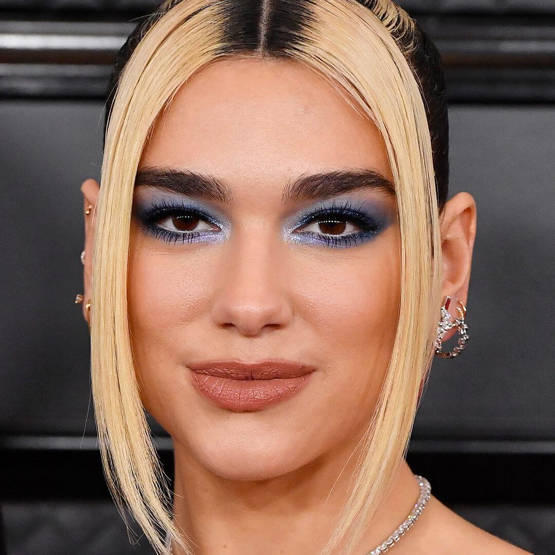 Dua Lipa rocking a pastel blue eyeshadow look Mobile