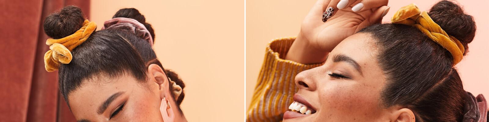 A model sporting a double bun hairstyle with scrunchees Desktop