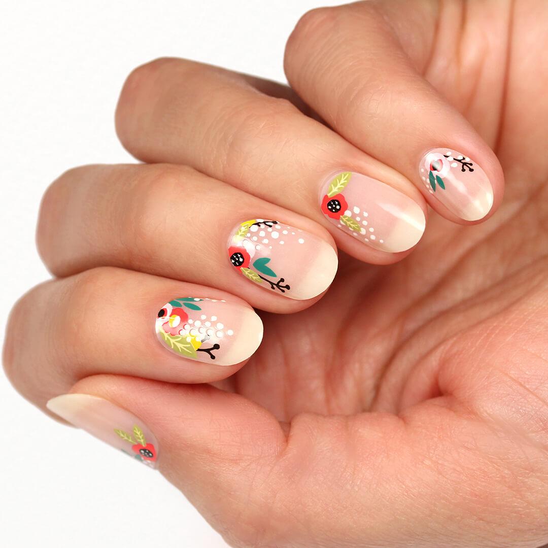 Close-up of a model's hands with MANIME Stick On Gel Mani in Floral Cuticles Desktop