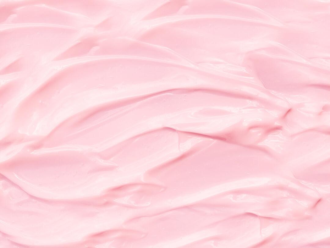 Pink texture cosmetic cream. Beauty creme smear, lotion, moisturizer smudge