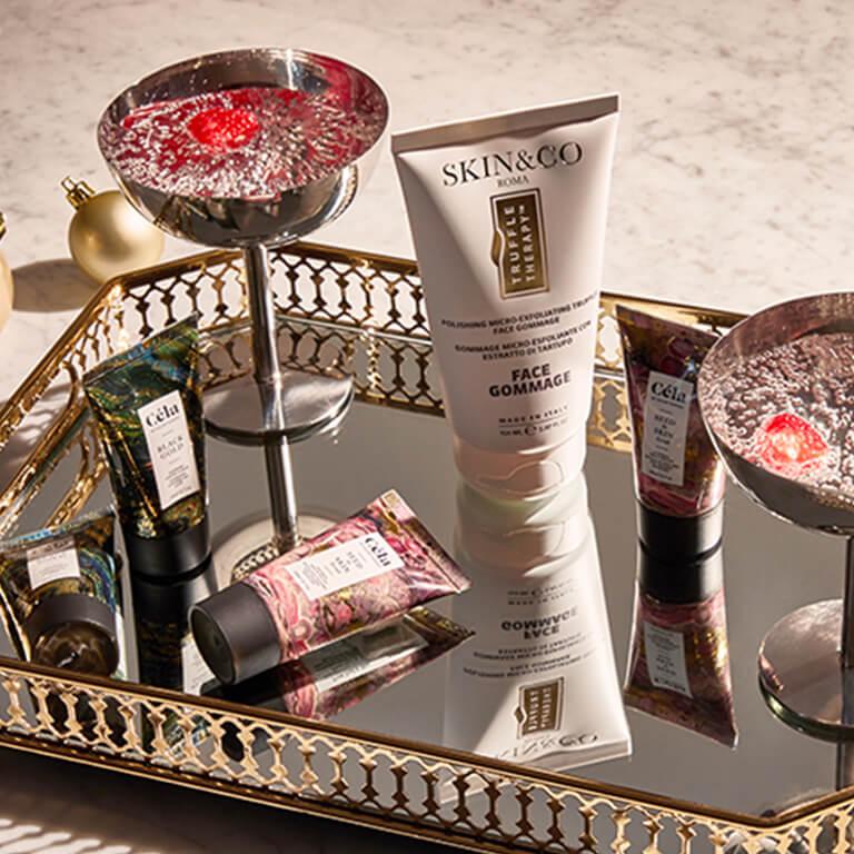 An image of skincare products on a mirror tray Desktop