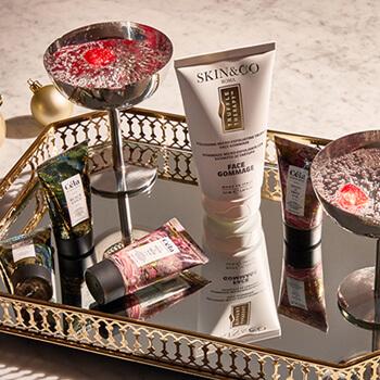 An image of skincare products on a mirror tray Mobile