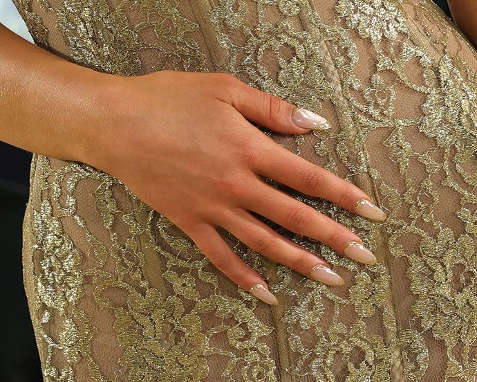 Tate McRae-s Antique Gold Frame Nails desktop