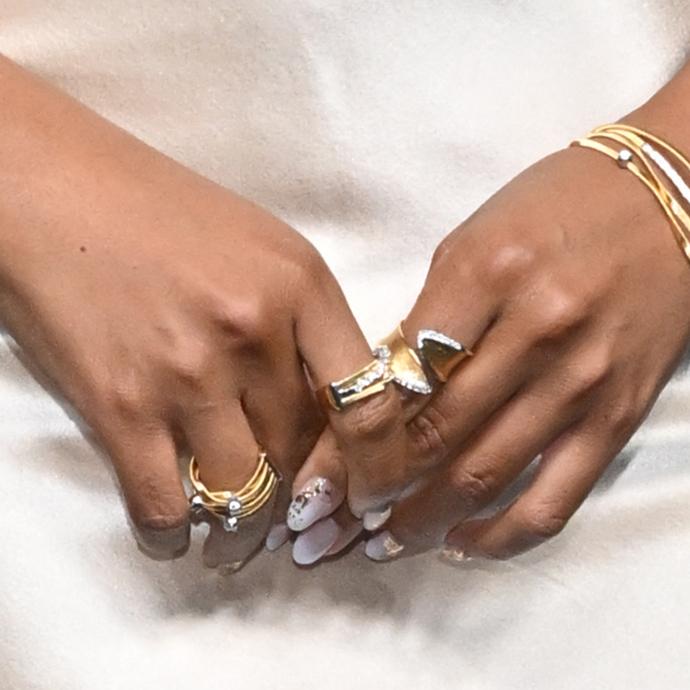 Quinta Brunson's Gold-Flecked Ombré Nails mobile