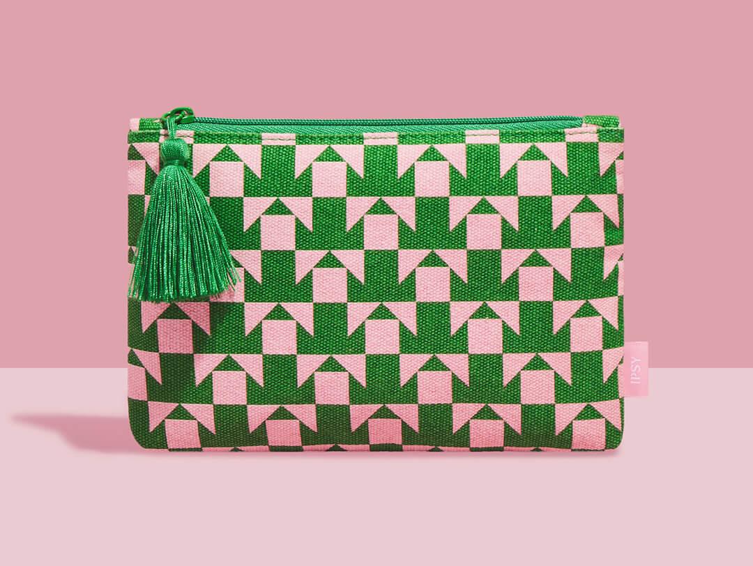 August 2023 IPSY Glam Bag on pink background Desktop