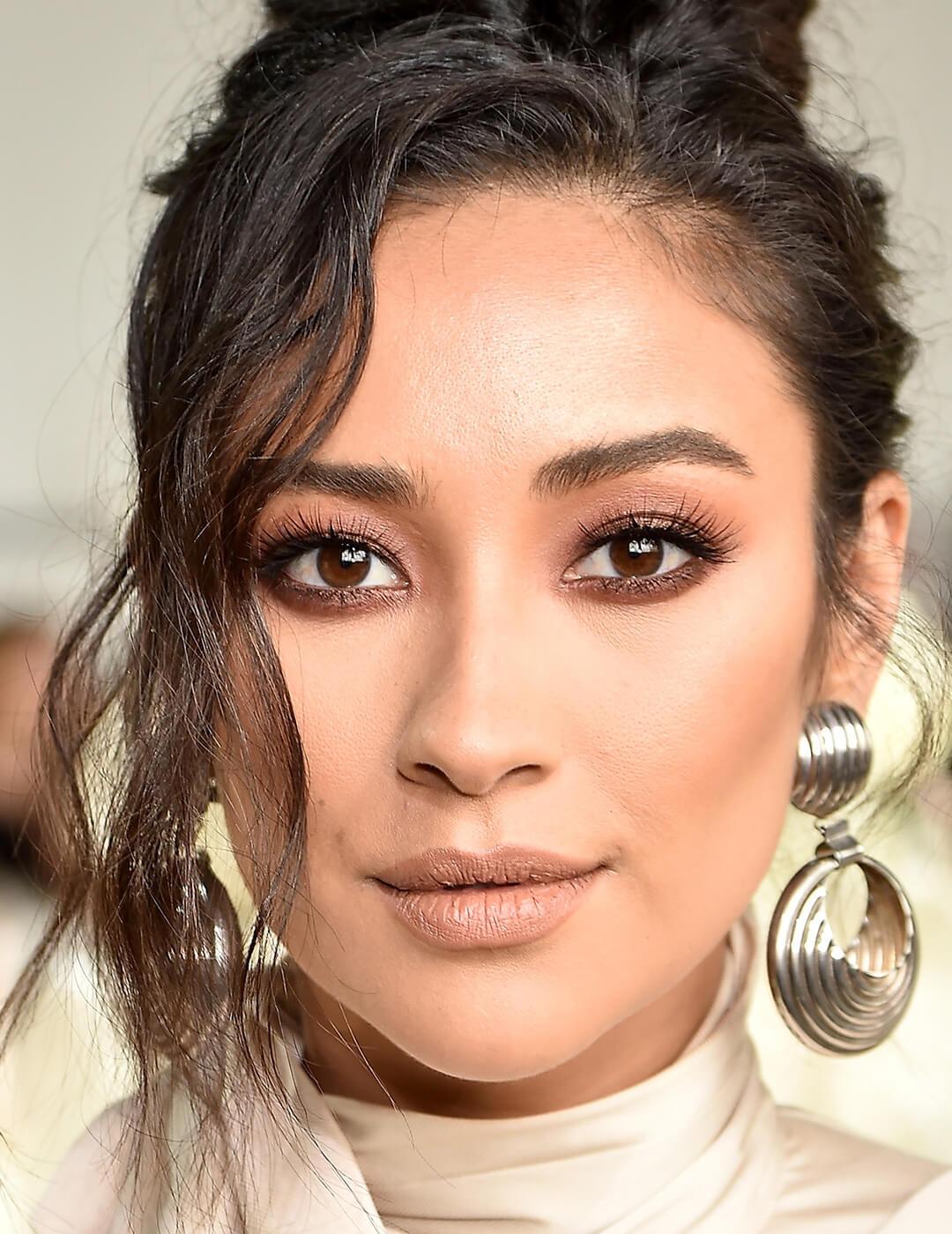 A closeup photo of Shay Mitchell with a monochromatic makeup look Desktop
