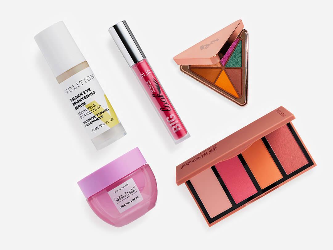 Skincare and makeup products from various brands on white background Desktop