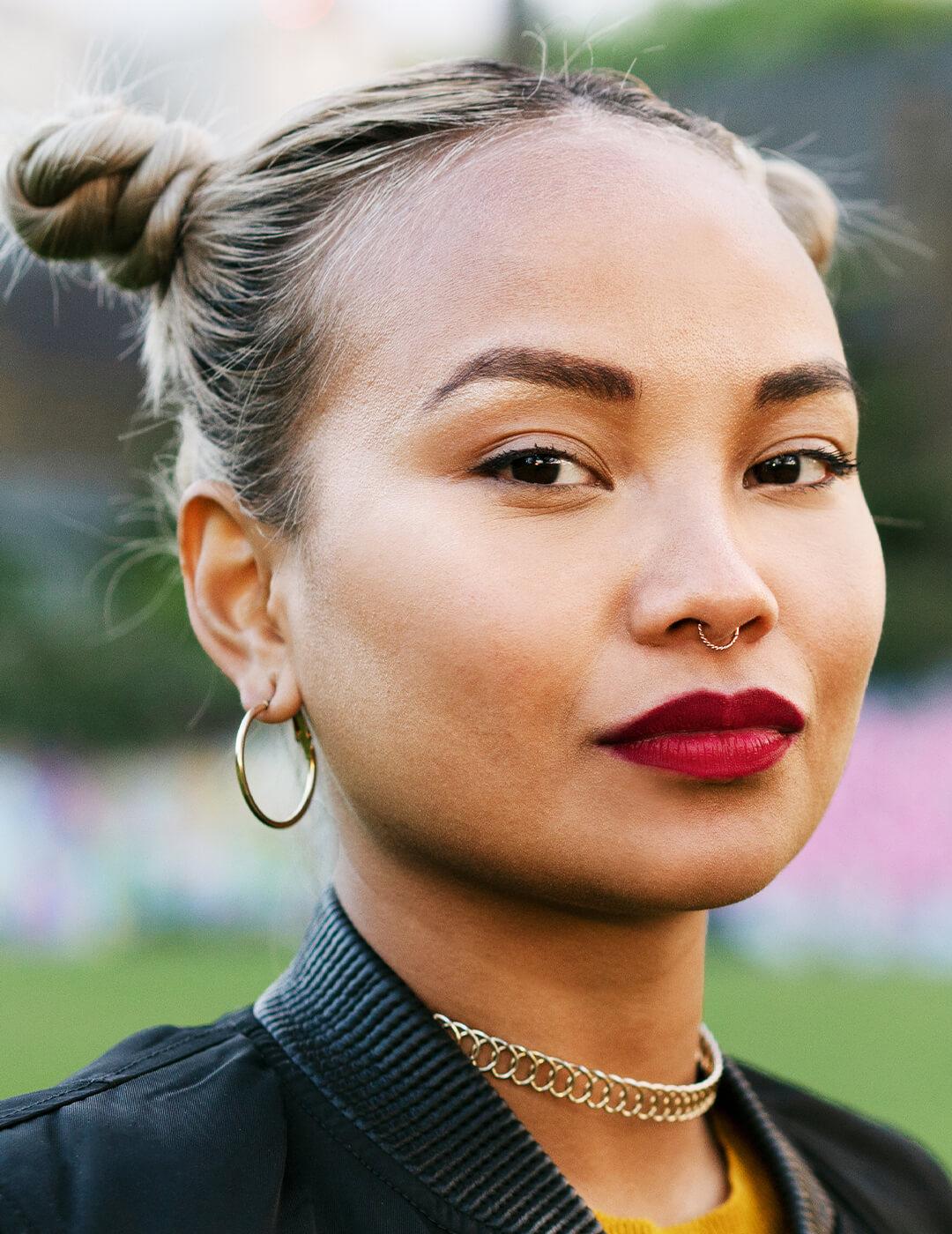 Portrait of woman in city park Mobile