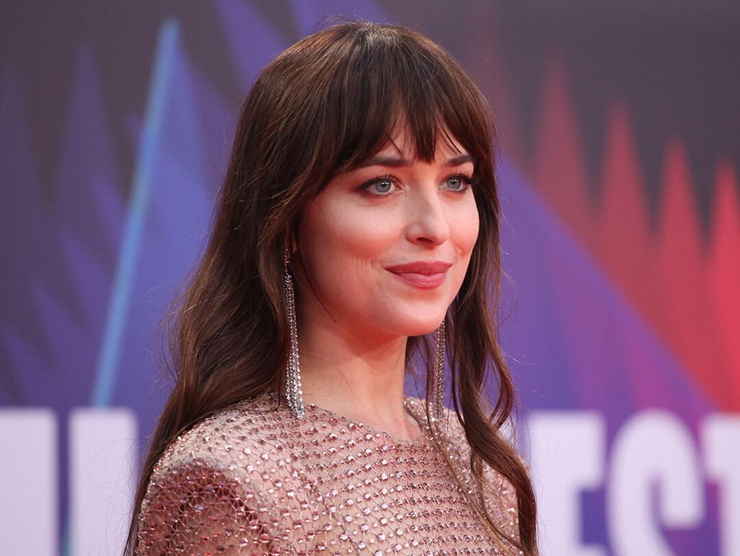 Dakota Johnson looking glam on the red carpet Desktop