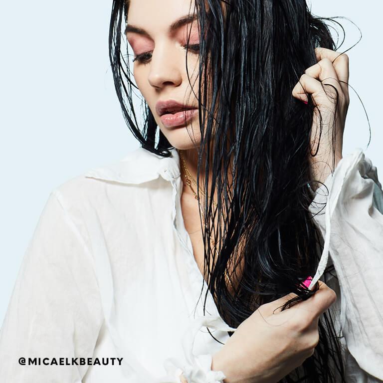 Micaela Klein washes her hair with leave-in conditioner. Desktop