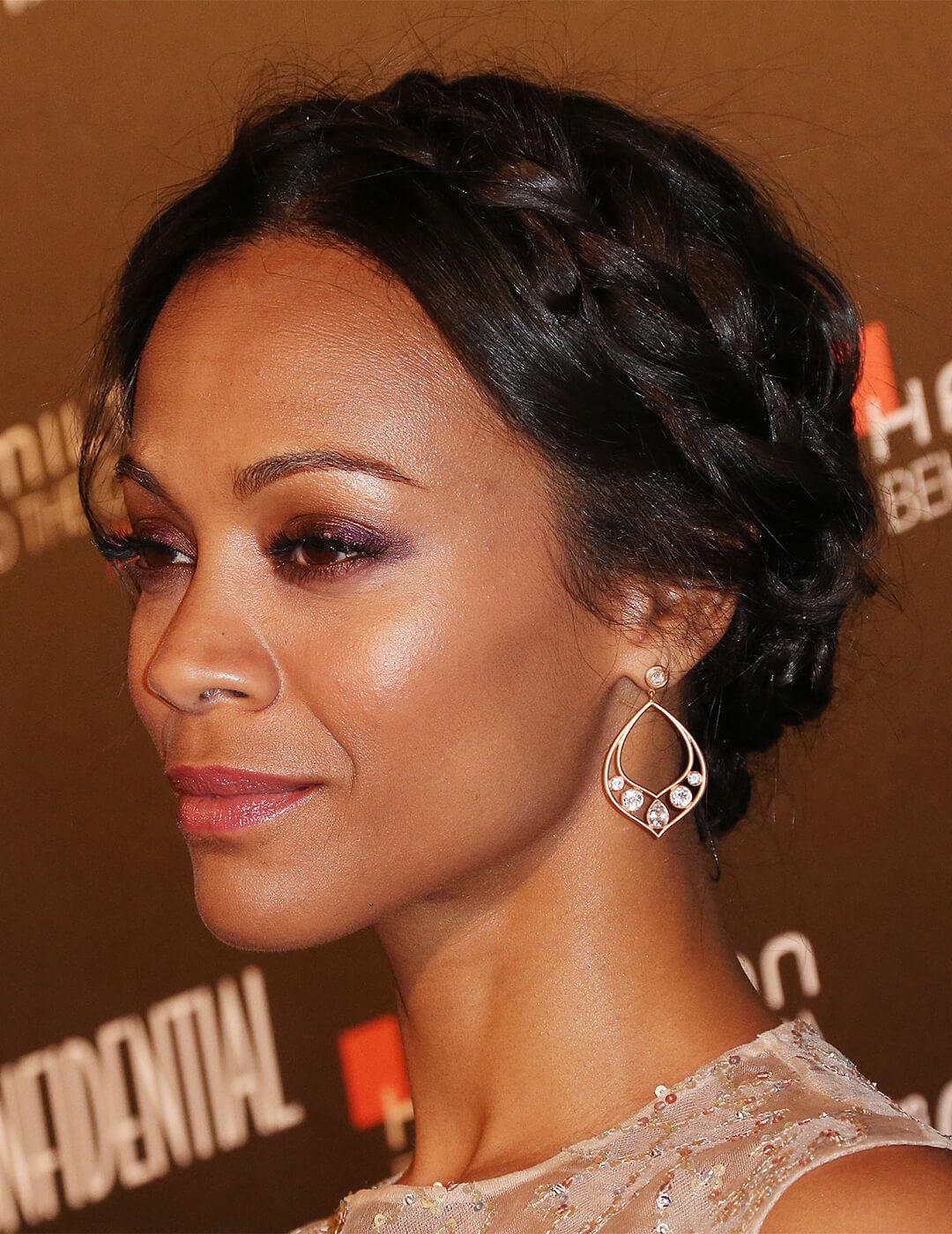 Close-up of Zoe Saldana rocking a smoky eyeshadow makeup look and crown braided hairstyle Mobile