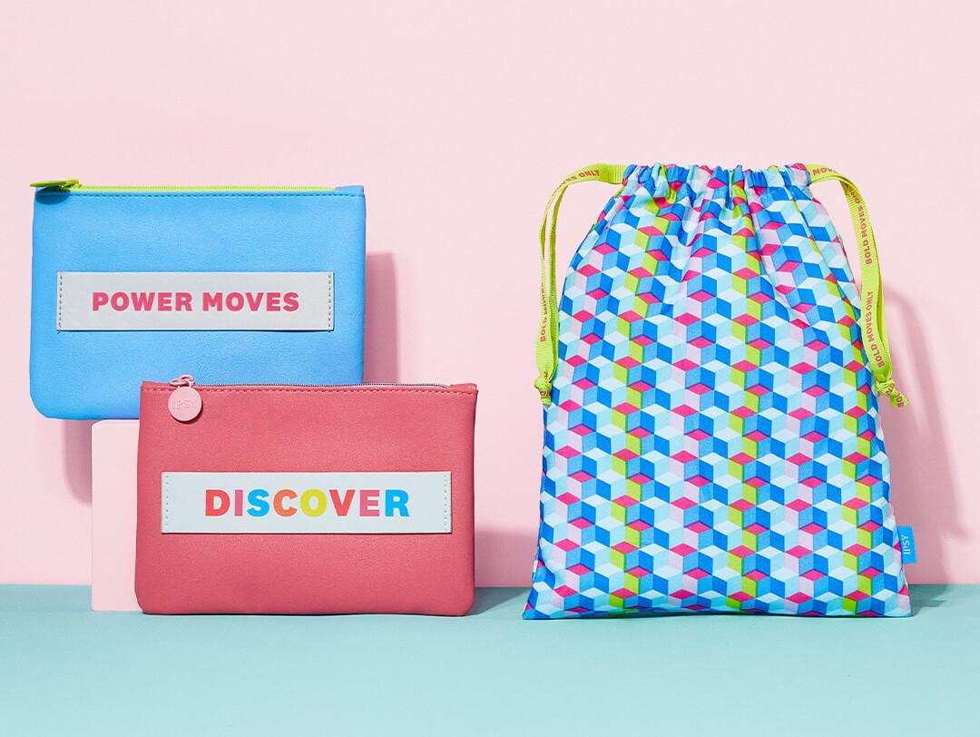 March 2022 IPSY Glam Bag and Glam Bag Plus bags on light pink and mint green background Desktop