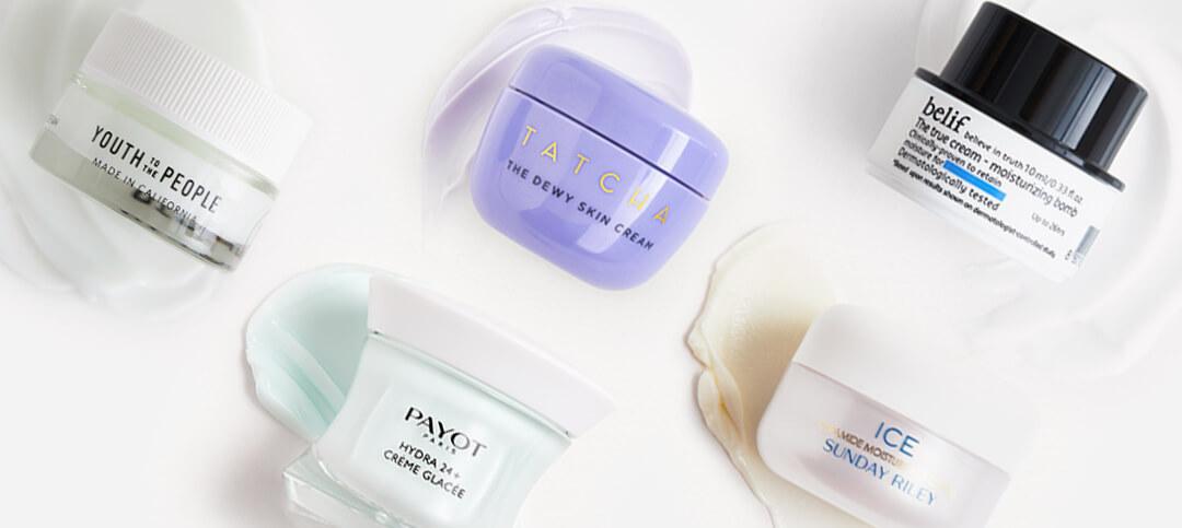 Natural face moisturizers from various brands swatched on white background Desktop