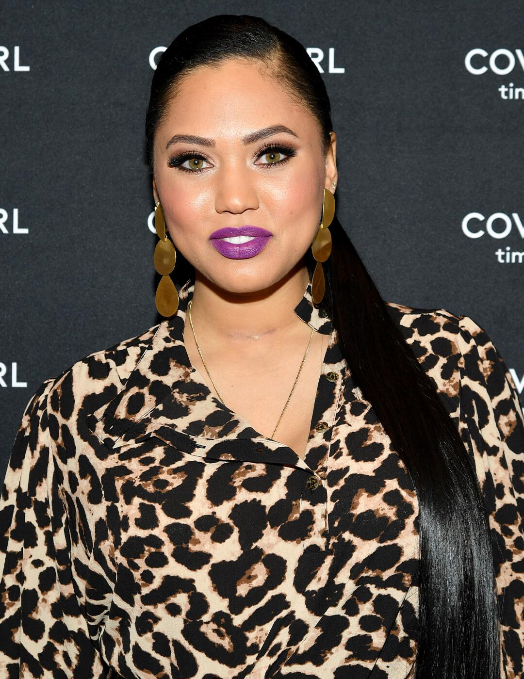 Ayesha Curry in a leopard-print dress rocking hair straigh, low ponytail hairstyle Mobile