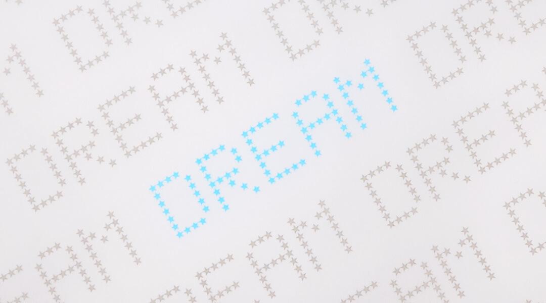 Print pattern with the word dream repeated in gray and blue colors Desktop