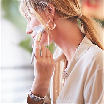 An image of a model using the COMPLEX CULTURE Contour • Blush Brush Mobile