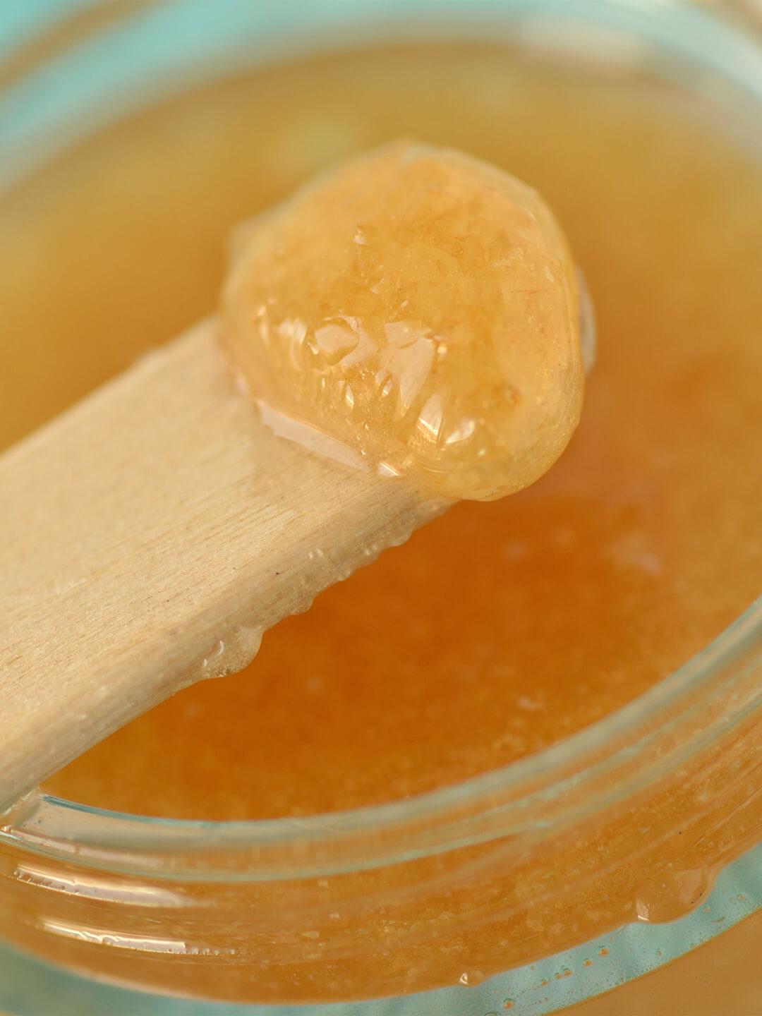 Image of a jar of lip scrub and spatula Desktop