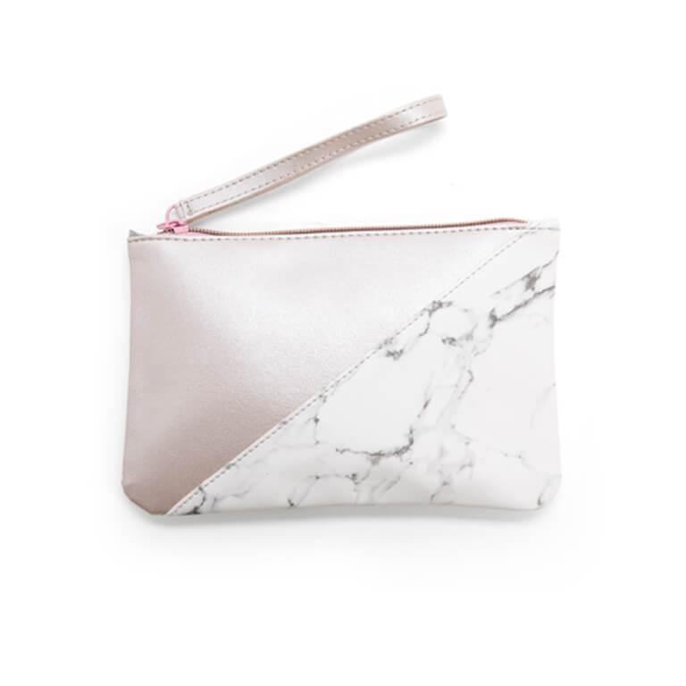 An image of the January Glam Bag Plus bag design and an image of the Glam Bag Plus with a few of the products in front. Mobile