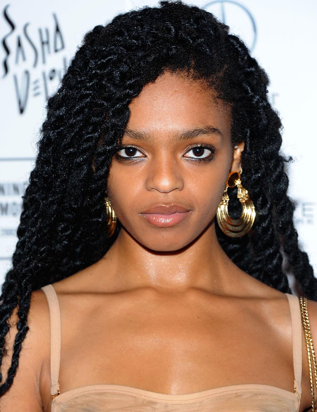 Close-up of model Selah Marley rocking a braided hairstyle Mobile