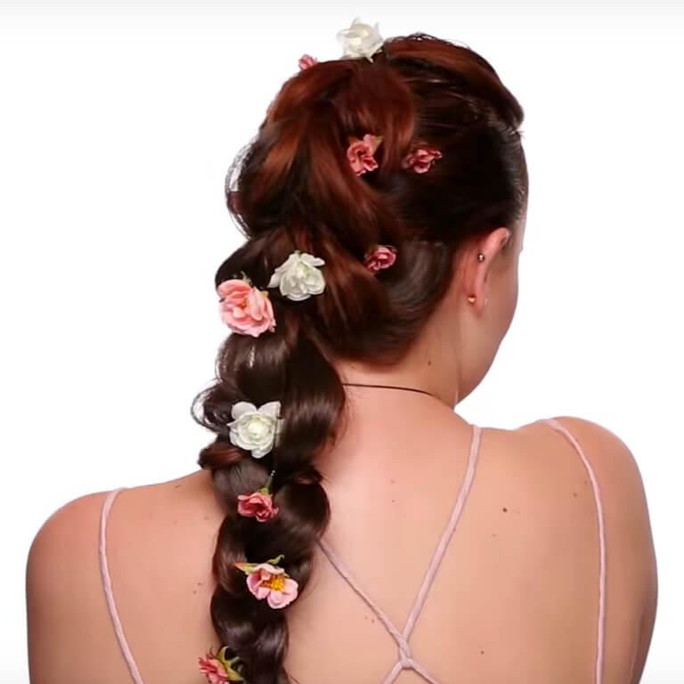 Haley Fite showing off a floral waterfall braid by Myesha Howze Mobile