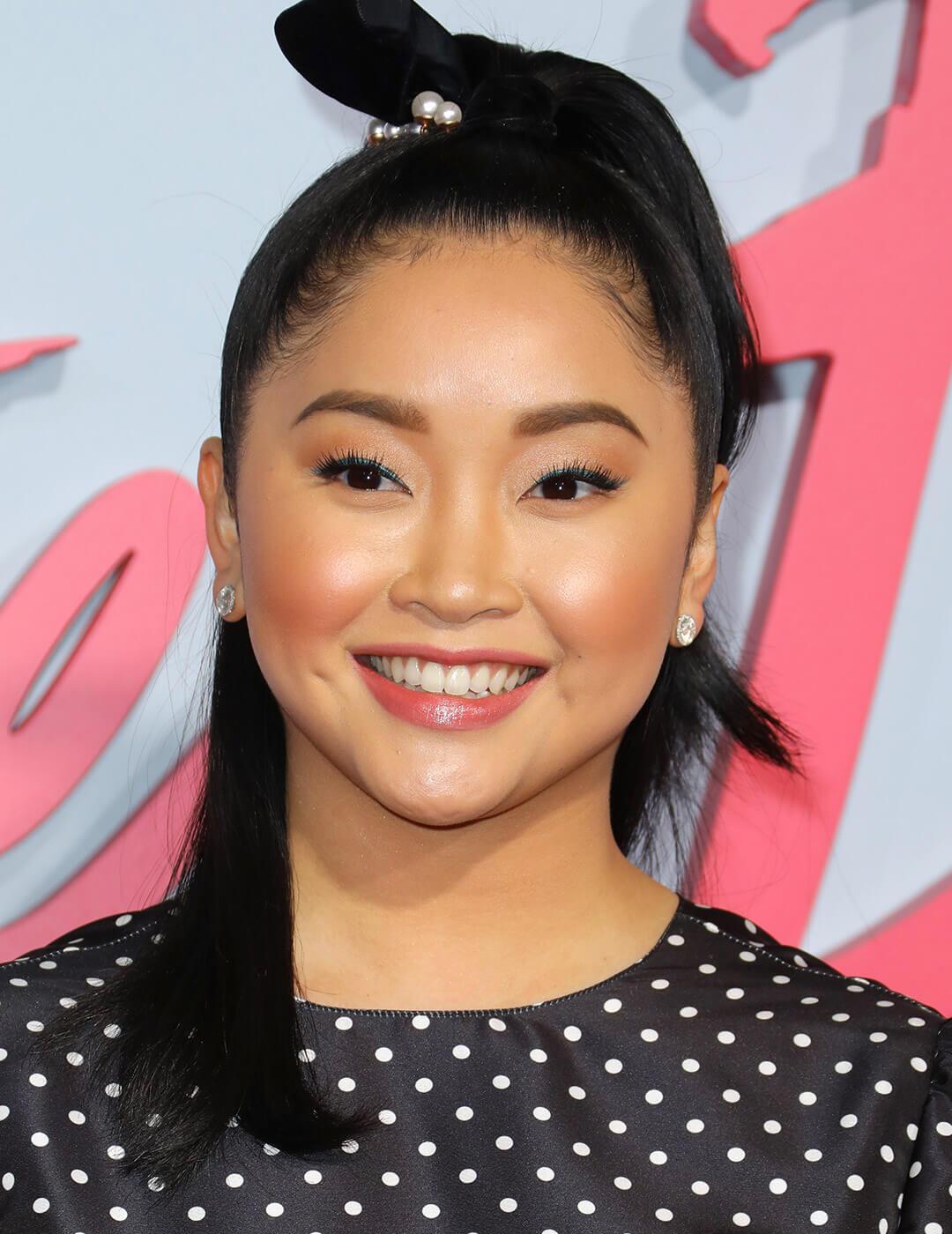 A photo of Lana Condor wearing a black hairband with pearls Mobile