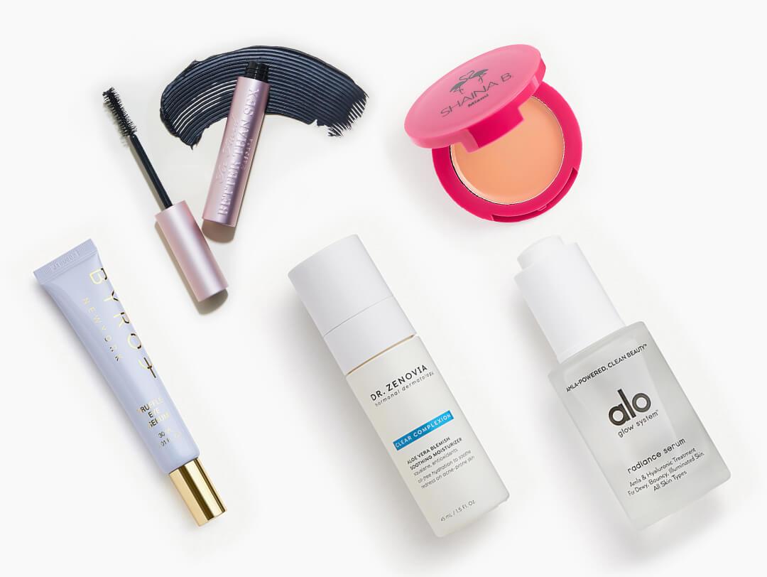Makeup and skincare products from the August 2022 IPSY Glam Bag Plus on white background Desktop