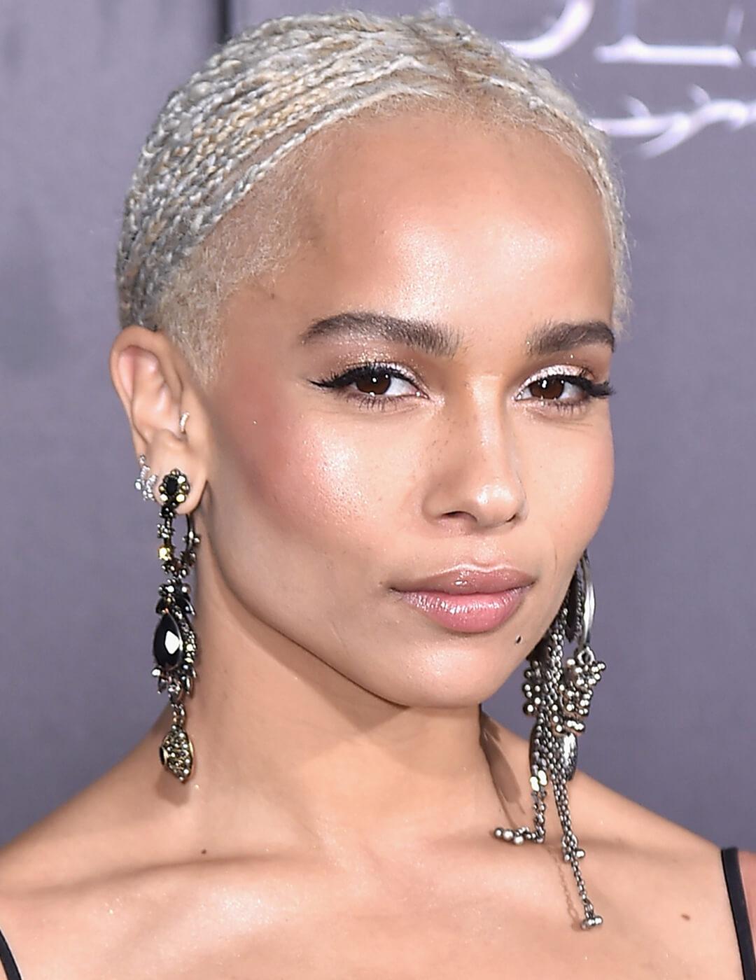 Zoe Kravitz looking fierce in a cateye makeup look and platinum micro braids undercut hairstyle Mobile
