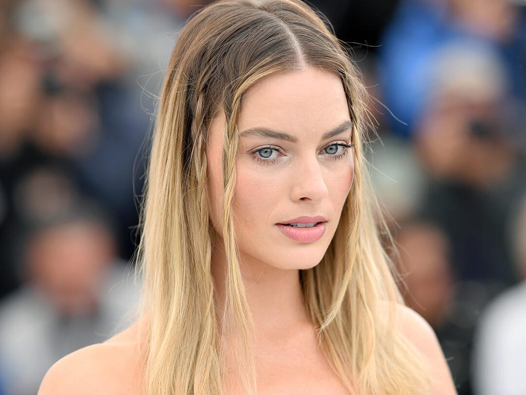 A photo of Margot Robbie attending the photocall for "Once Upon A Time In Hollywood" during the 72nd annual Cannes Film Festival on May 22, 2019 in Cannes, France Desktop