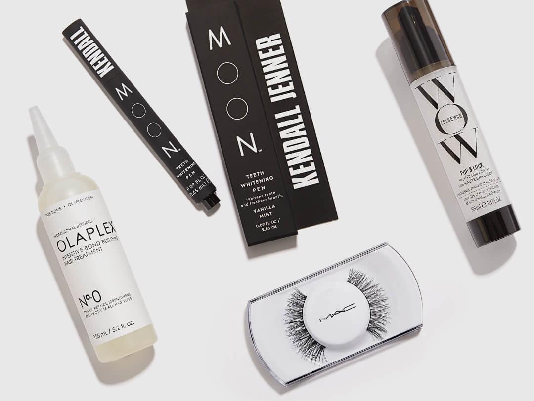 Skincare, hair care, and makeup products from the May 2021 Glam Bag X arranged on white background Desktop