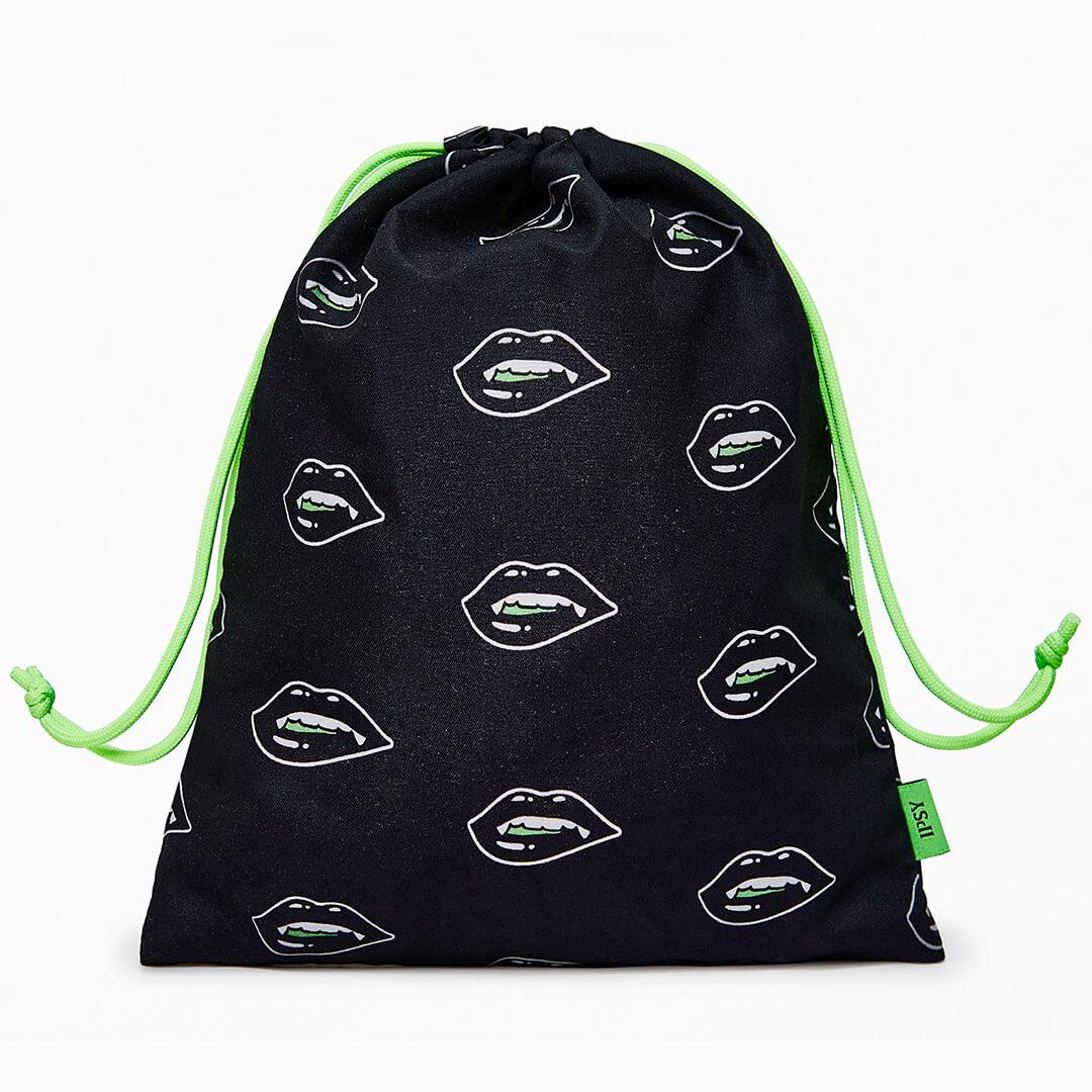 October 2021 IPSY Glam Bag Plus drawstring bag on white background Desktop