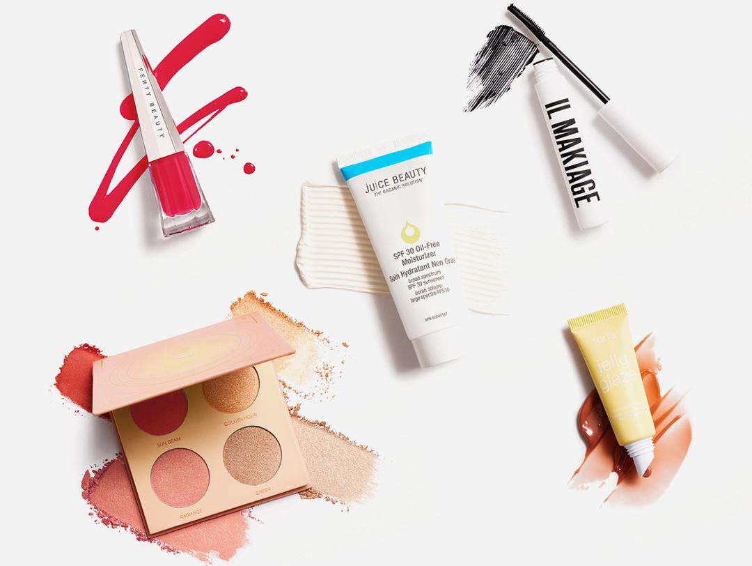 Nail, skincare, and makeup products from July 2021 IPSY Glam Bag Plus swatched on white background Desktop