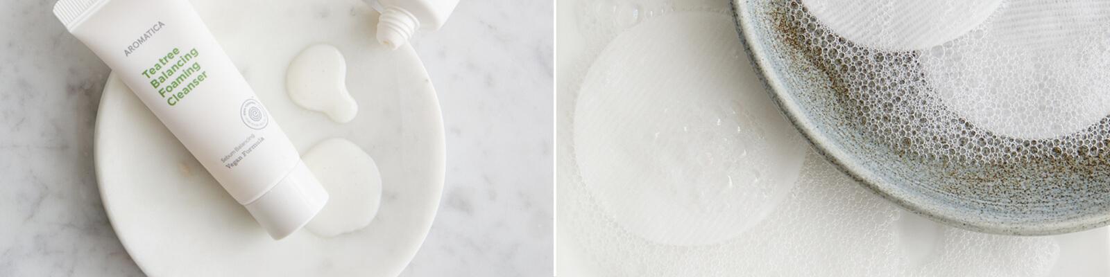 A flatlay image of the AROMATICA Tea Tree Balancing Foaming Cleanser and bubbly toner pads in a dish Desktop
