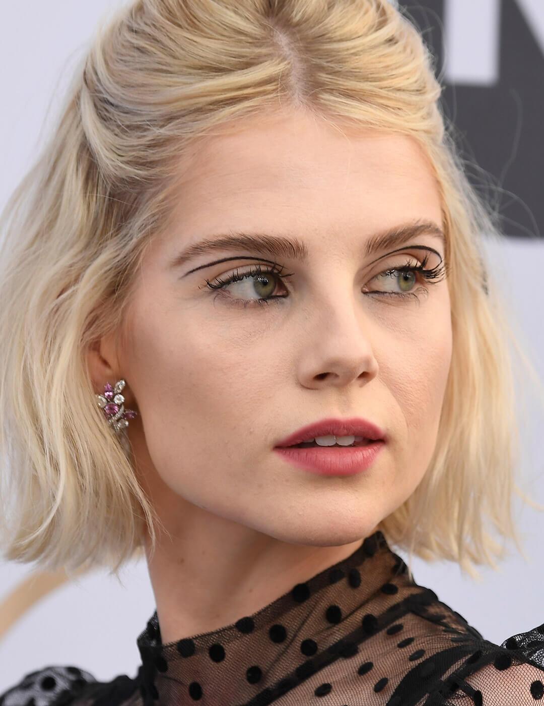 Lucy Boynton rocking minimal face makeup and a floating eyeliner look Desktop