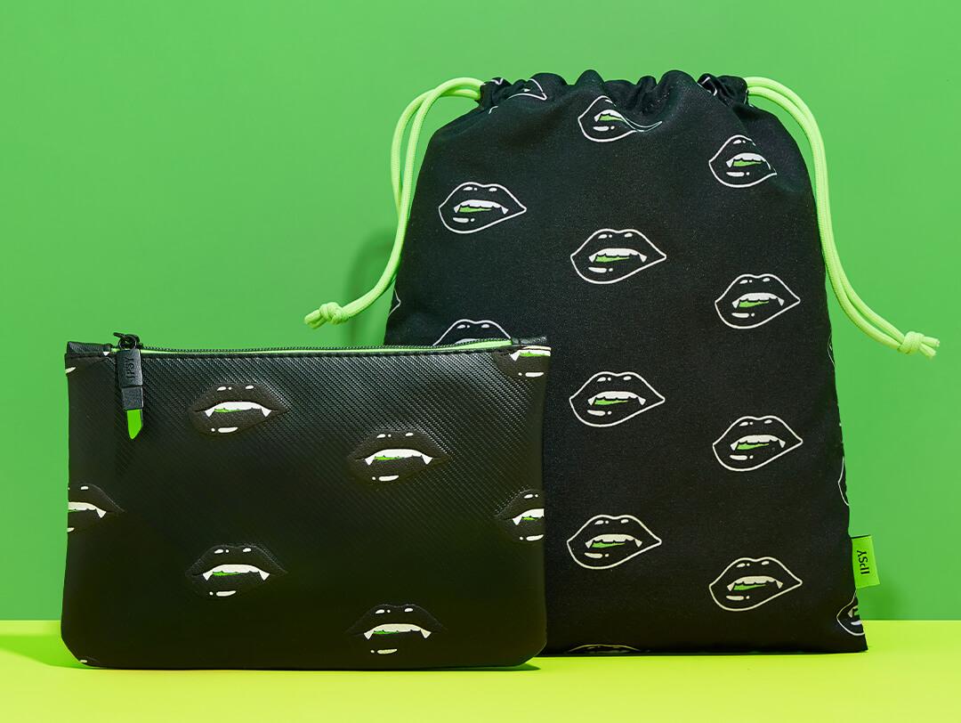 October 2021 IPSY Glam Bag and Glam Bag Plus against lime green and green background Desktop