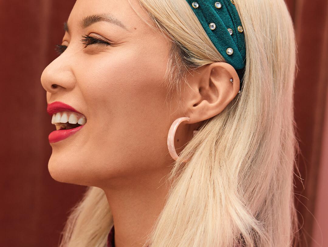 An image of a model with light blonde hair. Desktop