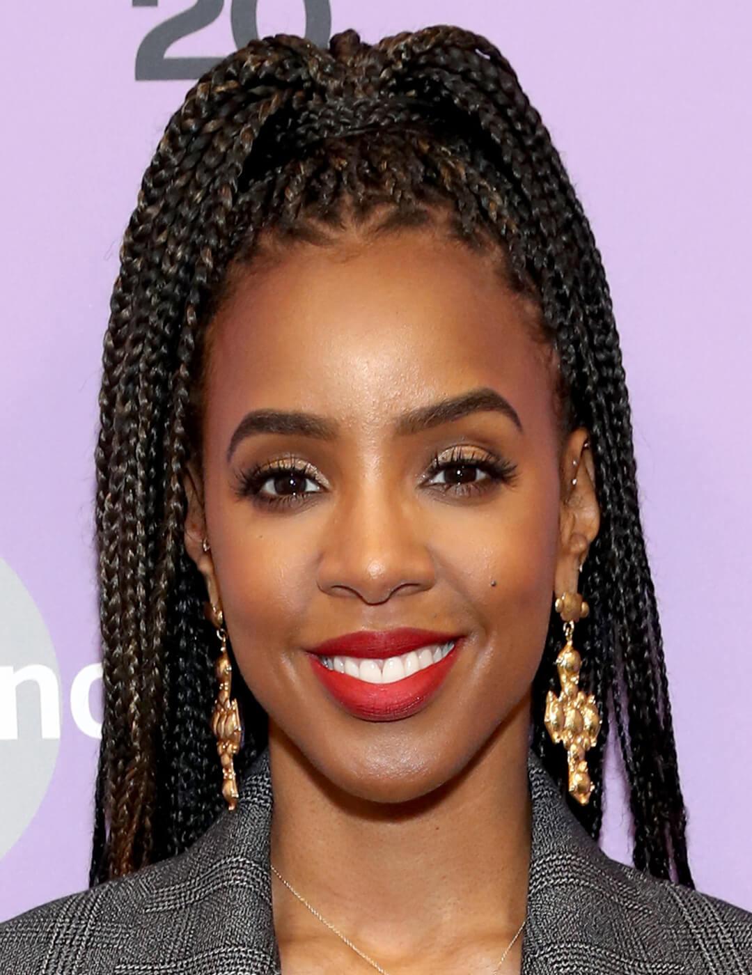 Kelly Rowland rocking a braided high ponytail hairstyle Mobile