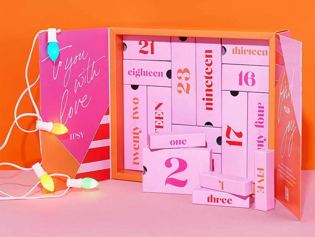 Colorful orange box with smaller pink boxes with numbers and colorful lights on orange background Desktop