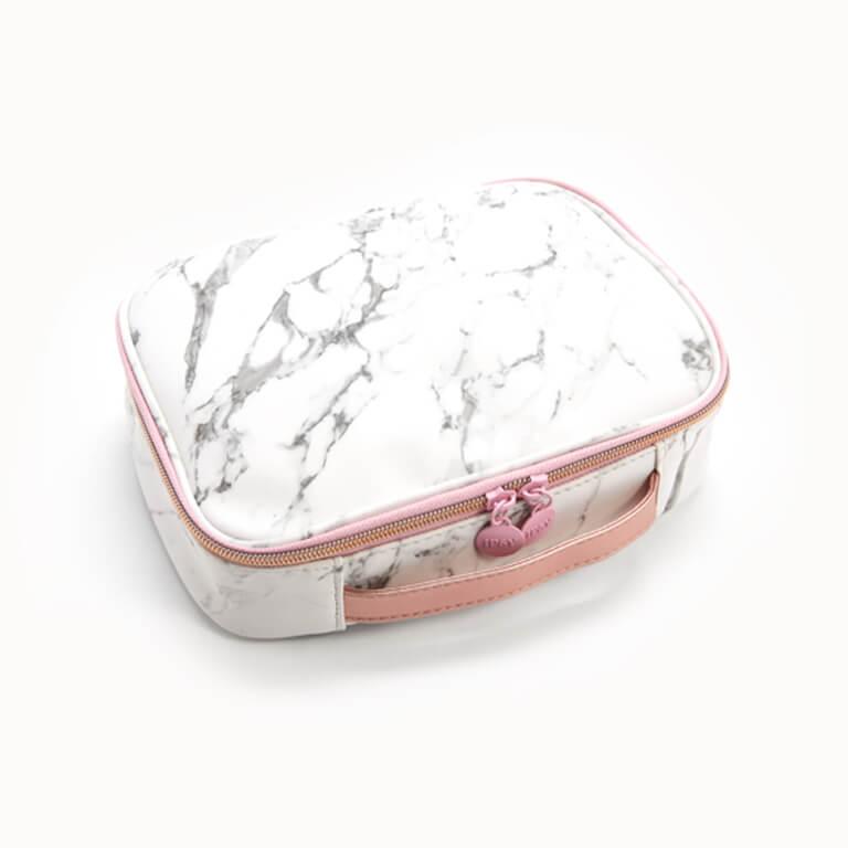 An image of the January Glam Bag Ultimate bag design and an image of the SWEET CHEF Kale + Vitamin B Serum Shot and its dropper Mobile