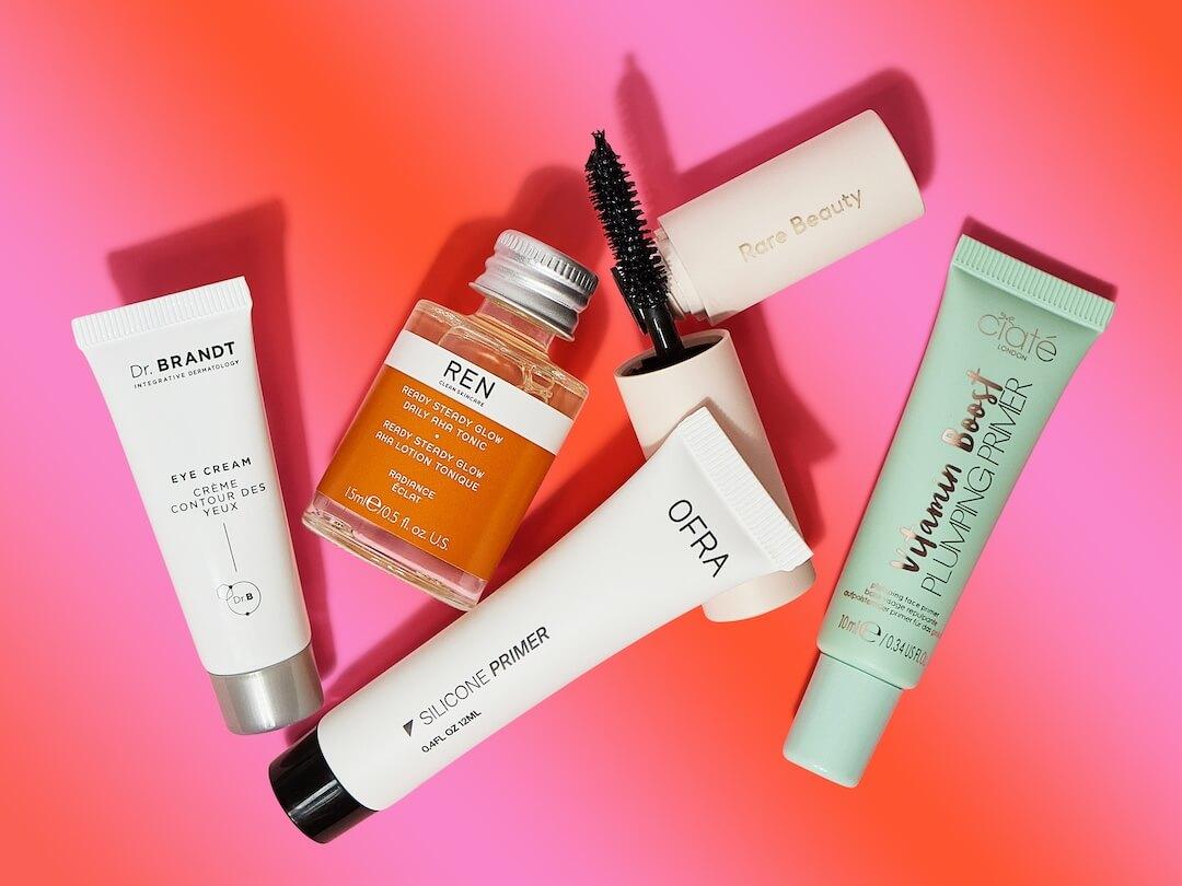 Power Picks beauty products from the February 2024 Glam Bag and BoxyCharm by IPSY on gradient pink and red background Desktop