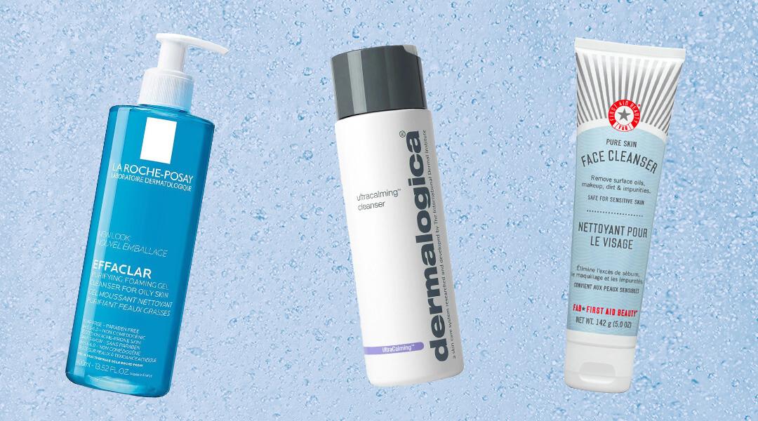 A flatlay of different skincare products on a blue textured background with water moisture Desktop