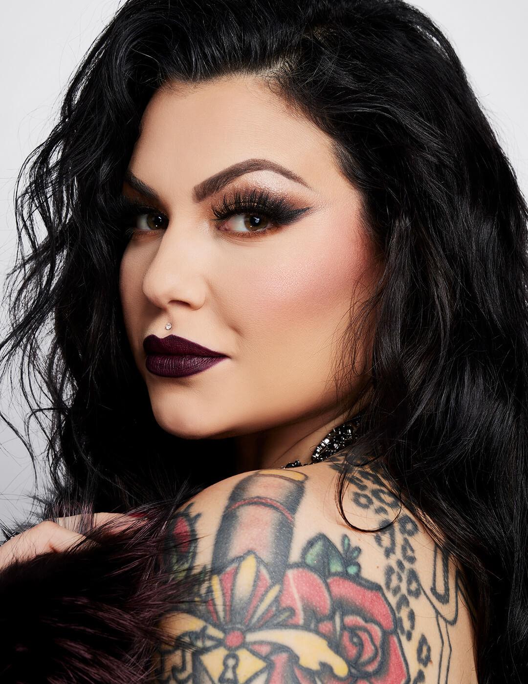 Close-up of Bailey Sarian rocking a dark eyes and dark lips makeup look Desktop